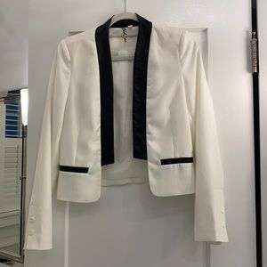 Cropped tuxedo style jacket